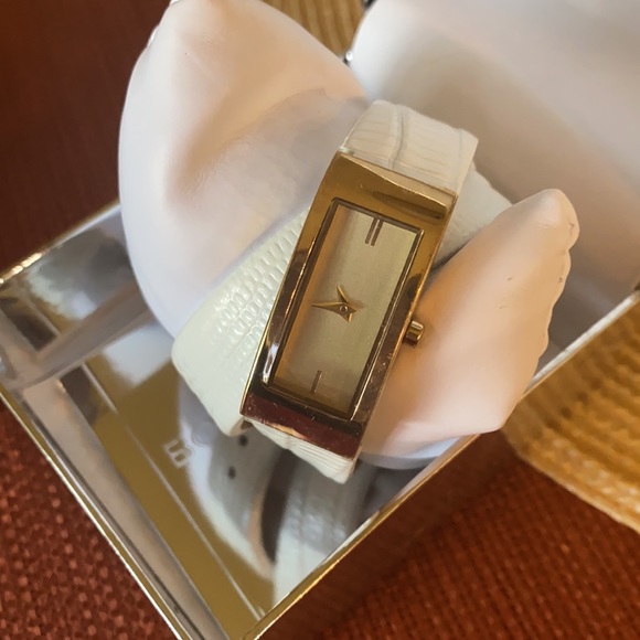 BCBGeneration. NWT.  Double strap watch.  Gold face w white. In box.  See pics main image 7